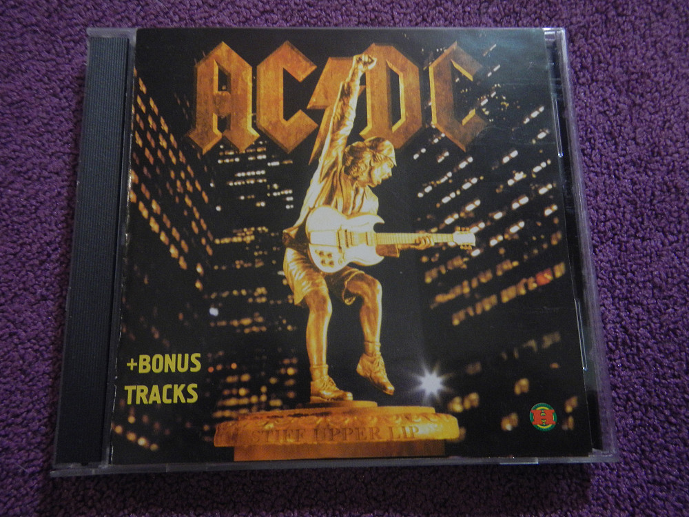 Ас cd. AC/DC stiff Upper Lip 2000. AC-DC 2000 stiff Upper Lip Vinyl. AC DC stiff Upper Lip коврик мышки. CD AC/DC: stiff Upper Lip.