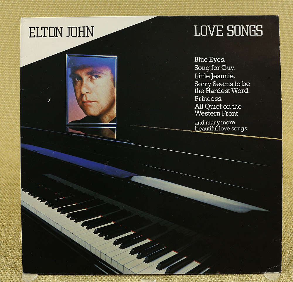 Песня sorry seems to be. Love Songs Элтон Джон. Love Song пластинка Elton. Elton John Vinyl. Elton John Love Songs пластинка.