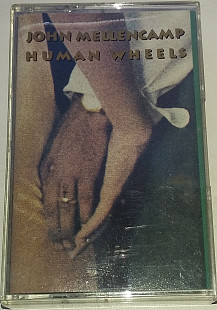 JOHN COUGAR MELLENCAMP Human Wheels. Cassette (US)