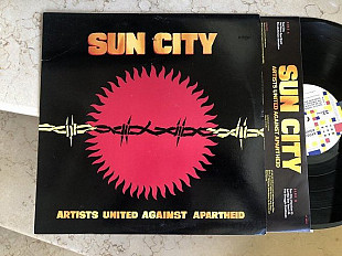 Bono ( U2 ) + Keith Richards + Ron Wood + Miles Davis + Ron Carter = Sun City ( USA ) LP