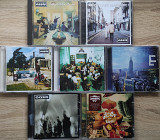 Фирменные CD группы Oasis