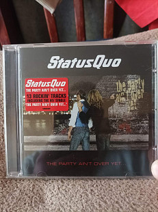 Status Quo – The Party Ain't Over Yet...