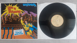 BALTIMORA LIVING IN THE BACKGROUND - TARZAN BOY ( EMI 064-118626 1 A1/B1 ) 1985 GERMANY