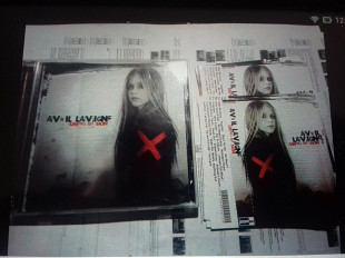 Avril Lavigne .under my skin p2004arista usa