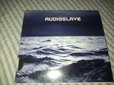 Audioslave "Out Of Exile" фирменный CD Made In Germany.