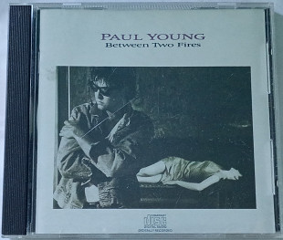 PAUL YOUNG Between Two Fires CD US