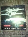 Status Quo-Rockin`All Over The World.