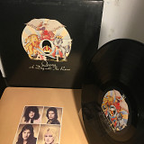 QUEEN – A DAY AT THE RACES