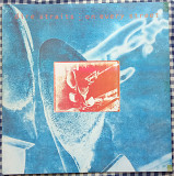Dire Straits – On Every Street