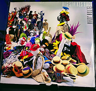 Elton John ‎– Reg Strikes Back