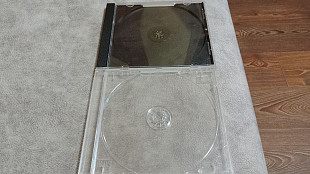Фирменные cd-боксы с черным и прозрачным треем в идеальном состоянии