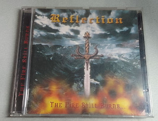 Reflection - The Fire Still Burns...