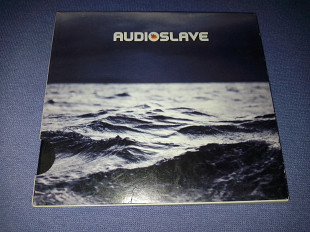 Audioslave "Out Of Exile" фирменный CD Made In Germany Limited Edition.