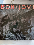 Bon jovi.slippery wen wet
