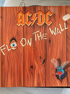 Ac dc.fly on the wall