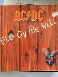 Ac dc.fly on the wall