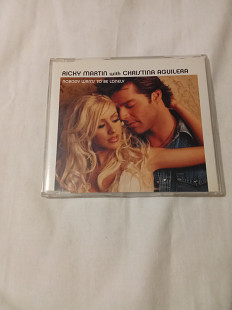 Ricky Martin with Christina Aguilers/nobody wanst to be lonely/2001