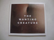 THE WANTING GREATURE