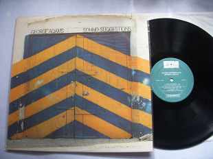 George Adams ( ECM )