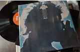 Bob Dylan's Greatest Hits Vol. III" — виниловый диск (сборник лучших хитов) лежит сверху, на его ора