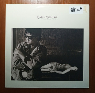 Paul Young – Between Two Fires