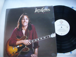 Larry Carlton